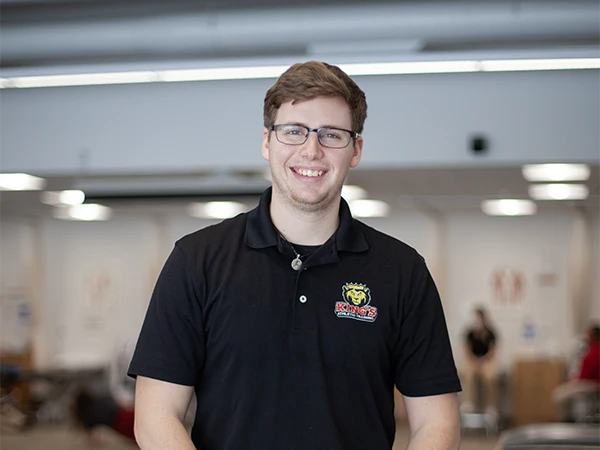 Athletic Training student posing in a polo shirt