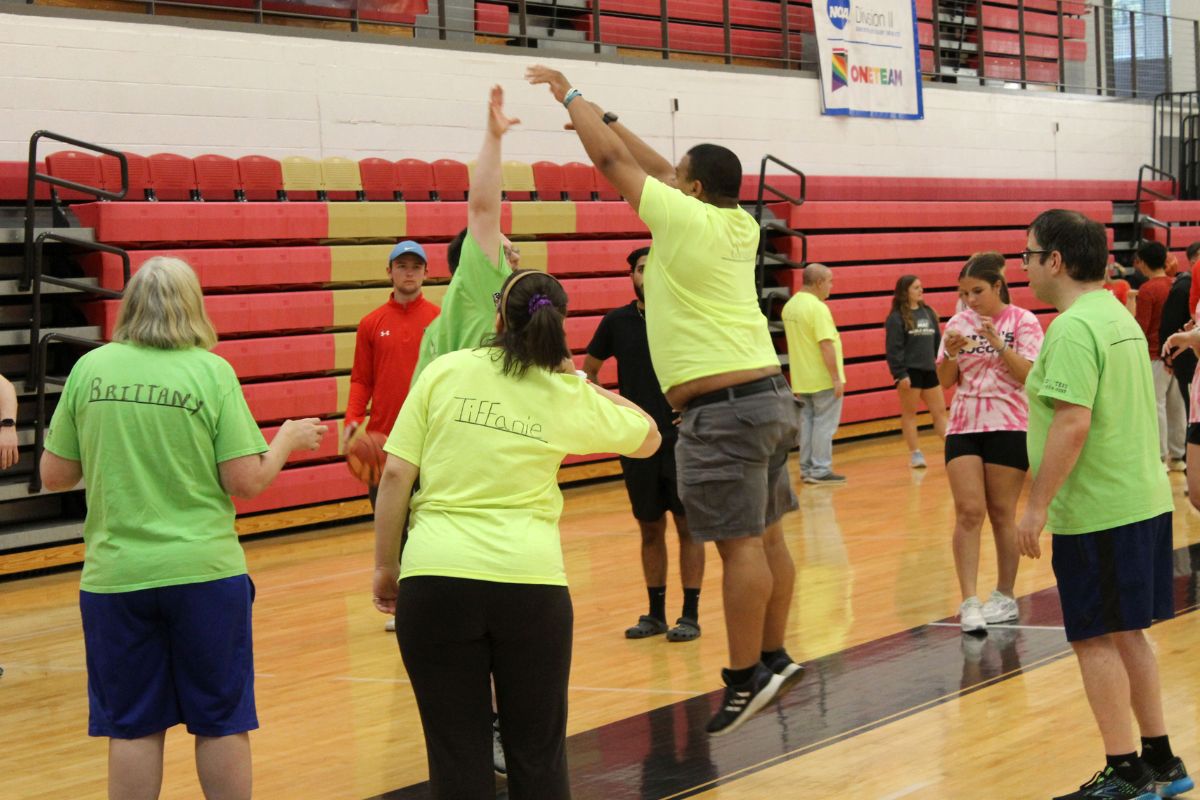 athletes playing basketball