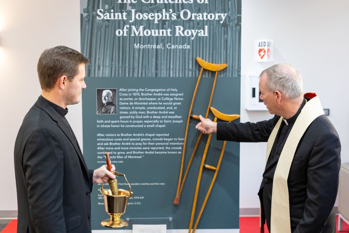 Fr. Brogan and Fr. Looney blessing Kowalski Center